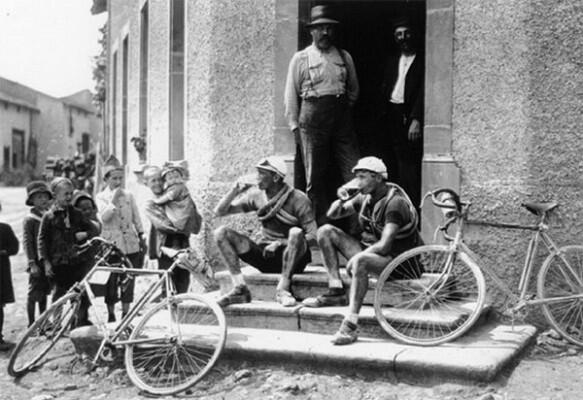 Cyclists drinking beer